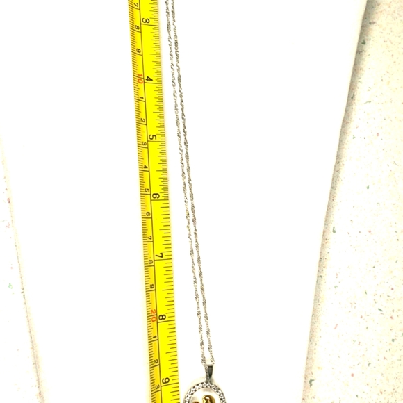 Round Cubic Zirconia Thanksgiving Mother Holding Child Gold Silver Tone Pendant - Picture 7 of 9